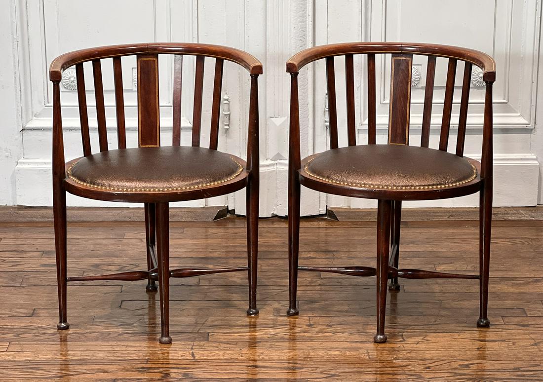 Two Edwardian Inlaid Mahogany Chairs: English, Early 20th Century, Each With Barrel Backs, Circular Seats With Leather And Nailhead Trim, Each 21w X 19d X 27.5h. See Photos For Additional Condition Information.