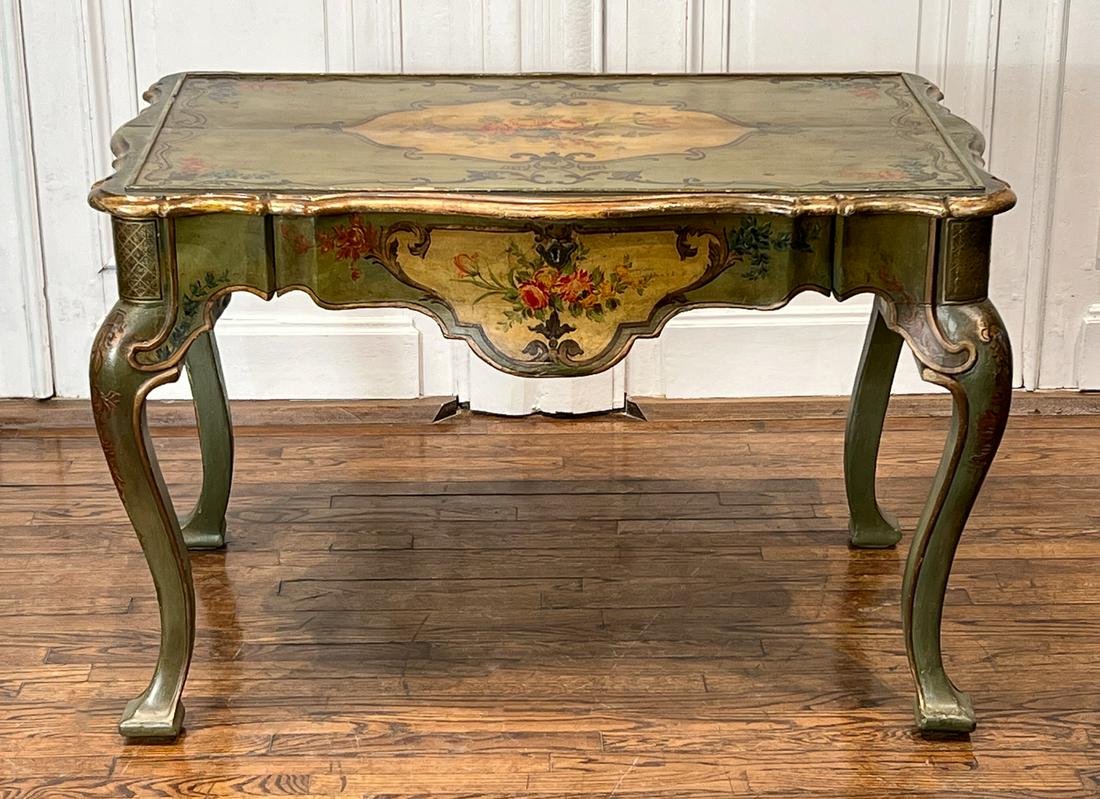 Venetian Painted Bureau Plat Desk: Italian, Late 19th Century, Rococo Style With Green Ground And Gilt And Floral Cartouches, Shaped Apron, One Drawer, Cabriole Legs, Height 32, Width 48, Depth 29 Inches, Structurally Sound, Overall Pa