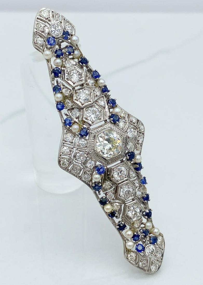 Sapphire And Diamond Pendant In Platinum (1 of 4)