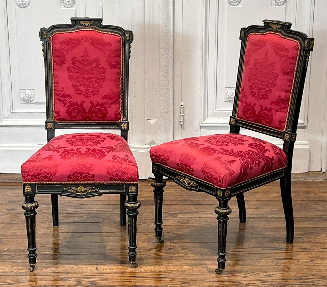 Pair Napoleon III Bronze Mounted Side Chairs: 19th Century, Each Blacked Painted Chaise With Shaped Crest, Padded Back And Seat With Later Crimson Red Damask Upholstery, Trumpet Legs, Height 37, Width, 18 Depth 18 Inches Seat Height 18 Inches, Bo