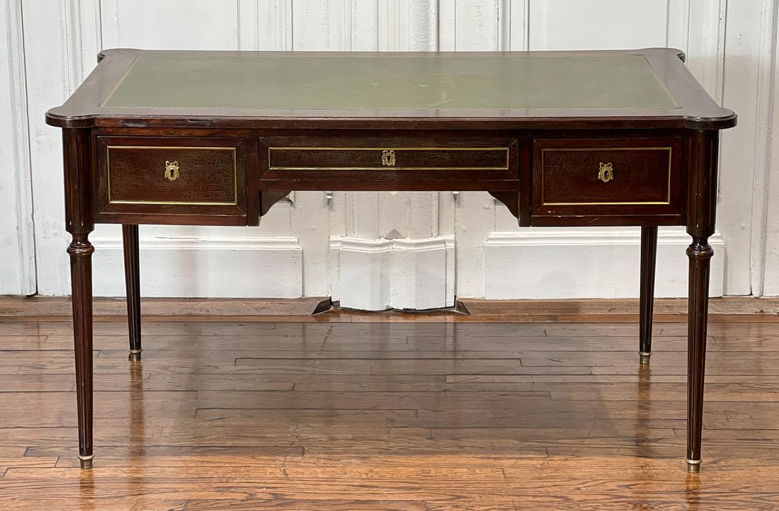 Louis XVI Style Bureau Plat Desk: 20th Century, Mahogany, Gilt Bronze Mounts, Tooled Green Leather Top And Sliding Writing Surfaces. 53w X 31d X 29.5h Inches, Surface Scratches And Nicks Consistent With Age. Wear To Leather Top. Craqu