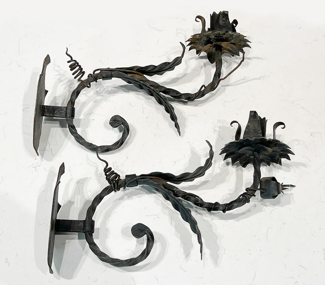 Pair Antique Iron Sconces: Each Flower Form Candle Cup On Scroll Arm With Leaves, Height 10, Width 5, Depth 14 Inches, Oxidized Surface. See Photos For Additional Condition Information.