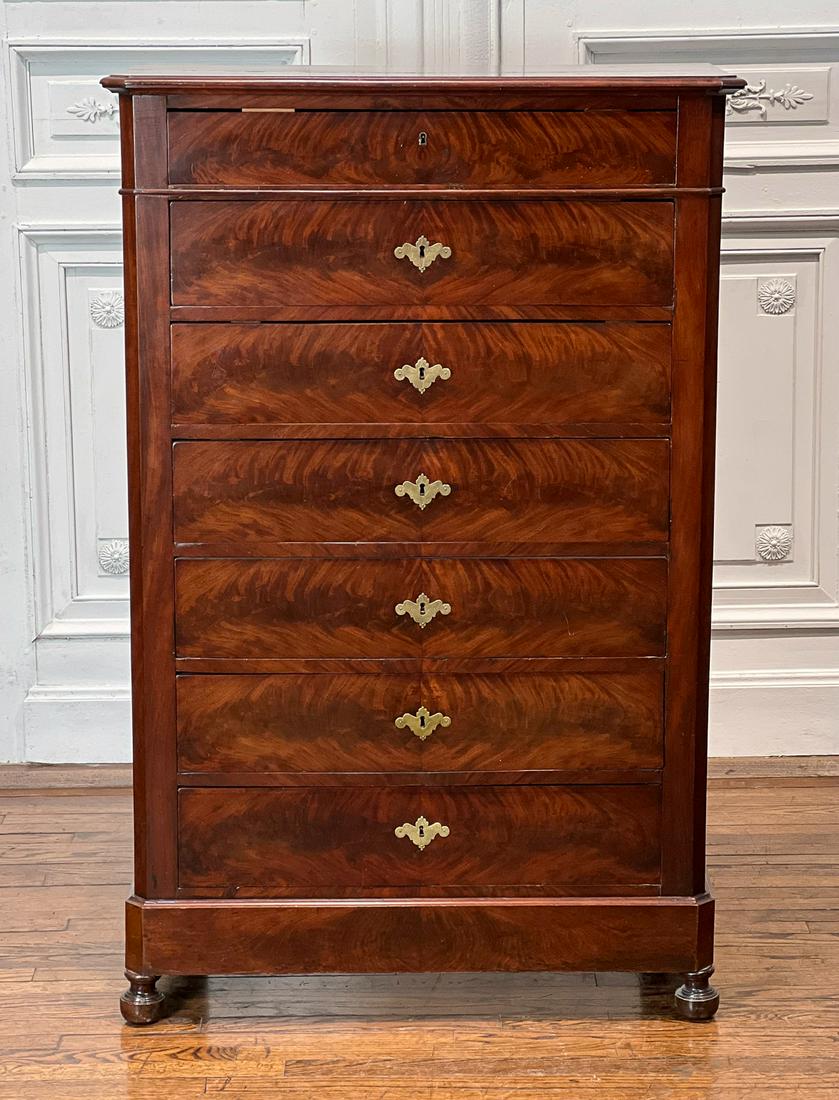 Antique French Mahogany Semanier Chest: Late 19th Century, Seven Flame Veneer Drawers, 58 X 37.5 X 18 Inches, Drawer Fronts Slightly Bowed, Nicks And Scratches Consistent With Age. See Photos For Additional Condition Information.