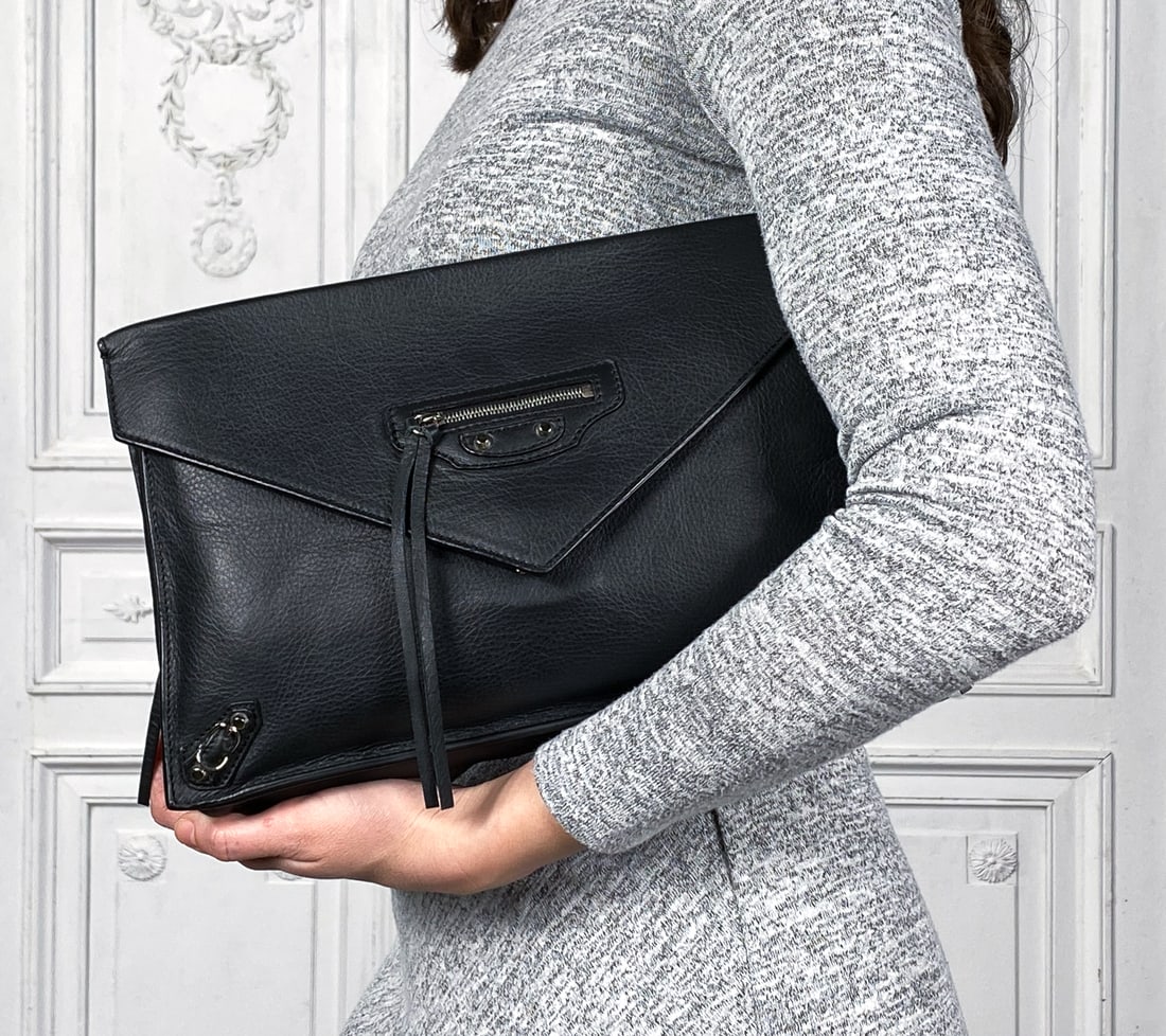 Balenciaga Papier Zip-Around Sight Clutch: Balenciaga Papier Zip-Around Sight Clutch Envelope Style Bag. Black With Olive Green Zippered Gussets. Attached Mirror Accessory Wrapped In Original Paper. Very Few Signs Of Use, Except For Some Press
