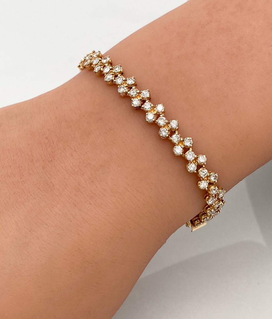 Diamond And 14k Yellow Gold Tennis Bracelet: Diamond And 14k Yellow Gold Tennis Bracelet, Approximately 2.5ctw I-K, SI1-SI2 Diamonds Set In 14k Yellow Gold. 6.5 Inches Long. 10.8g. See Photos For Additional Condition Information. This Lot Must B