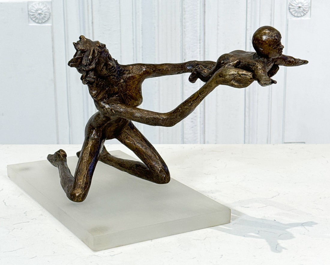 Modern Bronze Of Mother And Child: Modern Bronze Of Mother And Child, Late 20th Century, Kneeling Woman Holding A Baby Aloft, 9 X 15 X 6 Inches, Brushed Acrylic Base 13.5 X 8 Inches. See Photos For Additional Condition Information.