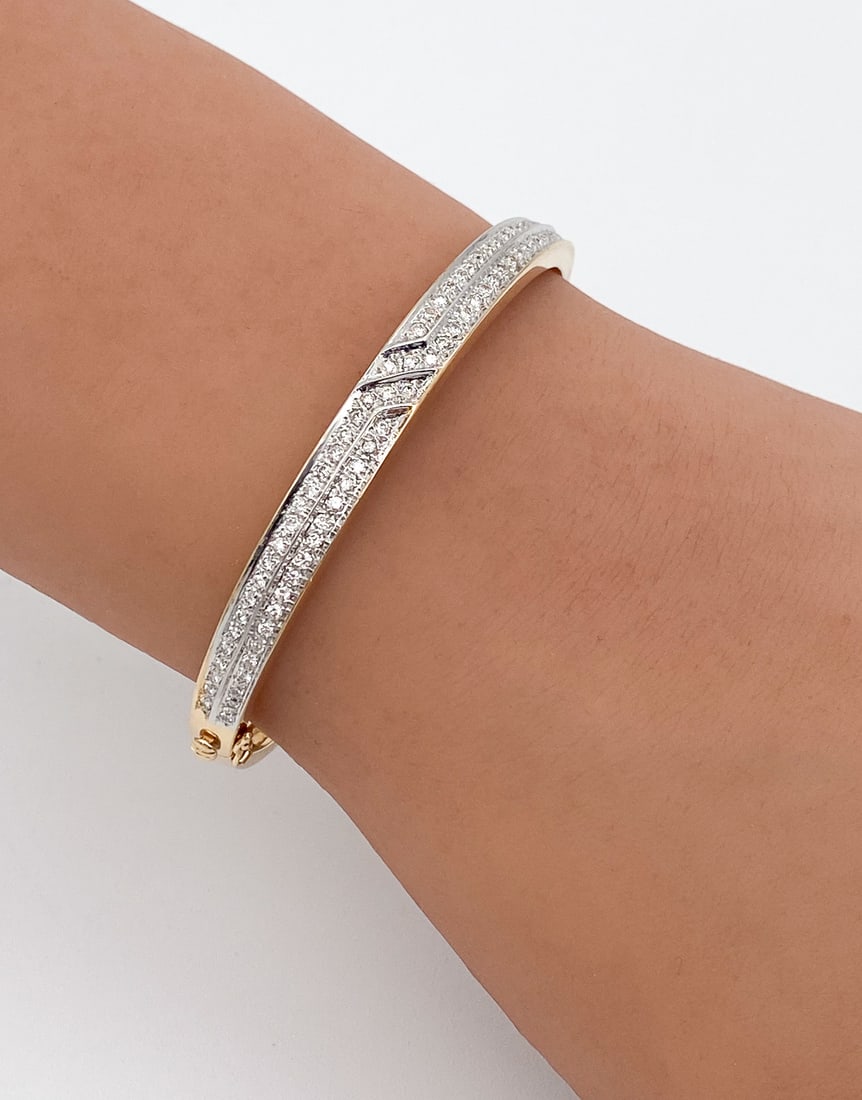 Diamond Bangle Bracelet, 14k Yellow Gold: Diamond Bangle Bracelet Having Approximately 1.3cts I-K, SI Round Brilliant Cut Diamonds Set In 14k Yellow Gold. Fits Up To 6.5 Inch Wrist. 16.4g. See Photos For Condition Information.