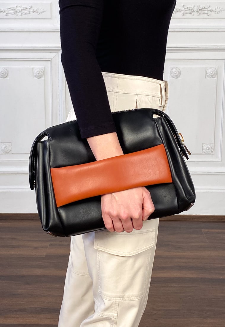 Balenciaga Two-Tone Clutch Bag: Retail Tag Attached. Includes Shoulder Strap, Care Booklet, Control Card, And Testing Swatch, And Additional Retail Tag. 9h X 12w X 4 Inches Deep. No Visible Signs Of Wear, Slight Microscratching To U