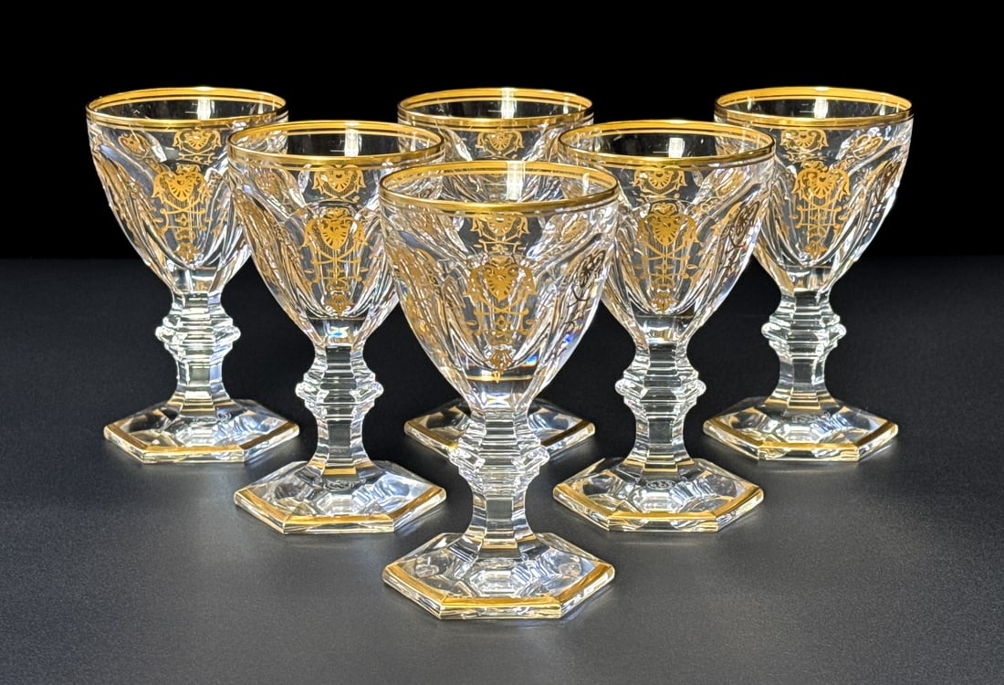 Six Baccarat Harcourt Empire Wine Glasses: Six Baccarat Harcourt Empire Wine Glasses, French, 20th Century, Each Cut Crystal Stem With Faceted Bowl, Gilt Anthemia And Rim, With Etched Circular Baccarat Mark Underside, Height 5 Inches. View All