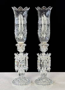 Pair Baccarat Crystal Candlestick Lusters: Pair Baccarat Crystal Candlestick Lusters, French, Each With Etched Medallion Pattern Hurricane Shade On Lobed Candlesticks Hung With Cut Glass Albert Prisms, Each With Circular Baccarat Mark On Shade