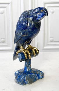 Large Lapis Lazuli Parrot Figure: Large Lapis Lazuli Parrot Figure, Glass Eyes And Brass Claws On A Lapis Perch, 12 X 6 X 5 Inches, Beak Reattached, Loss To Base Underside, Natural Inclusions Throughout. View All Photos For Additional