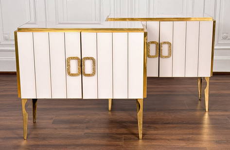 Pair Italian Brass And Glass Credenzas: Pair Italian Brass And Glass Credenza Cabinets, Each With Eglomise White Glass Panels With Brass Inlay, Molding, O-Form Handles And Tapered Legs, Hardwood Shelved Interior, Height 34, Width 38, Depth