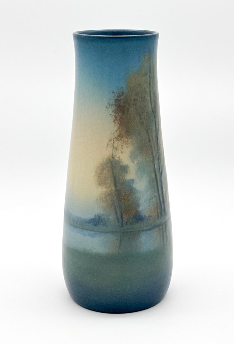 Edward Diers Rookwood Pottery Scenic Vase: Edward Diers Rookwood Pottery Scenic Vase, American, 1921, Vellum Glaze With Continuous Scene Of Trees On Earthenware Body, Underside Stamped With Flame Mark Xxi-950d-v, Artist Cipher, Height 9.5 X Di