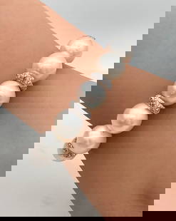 Pearl And Diamond Bracelet, 18k White Gold: Pearl, Diamond And 18k White Gold Bracelet, Having Cultured Pearls Approximately 14.53 - 11.20mm And Approximately 0.78 Ctw Diamonds. 34.30 Dwt. 6.5 Inches, Strung On Elastic. Payment By Secure Funds