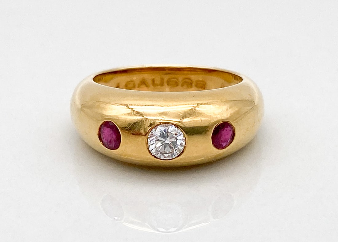 Cartier Ruby And Diamond 18k Yellow Gold Ring: Cartier Ring Featuring Approximately 0.70ctw G Color Diamond Accented By Rubies, 18k Yellow Gold, Size 6, 8.2 Grams Total Weight. Includes Papers And Cartier Ring Box. Note: Wire Transfer Or Cashiers