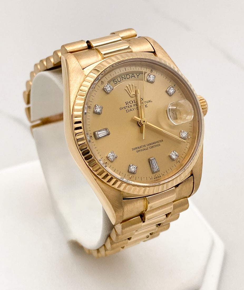 Rolex 18k Yellow Gold Day Date President Watch: Rolex 18k Yellow Gold Day Date President 36mm, Having Custom Dial With Tapered Baguettes And Round Brilliant Cut Diamonds Of F-H Color And VVS Clarity, 7 Inches, 134.2 Grams Total Weight. Includes Rol