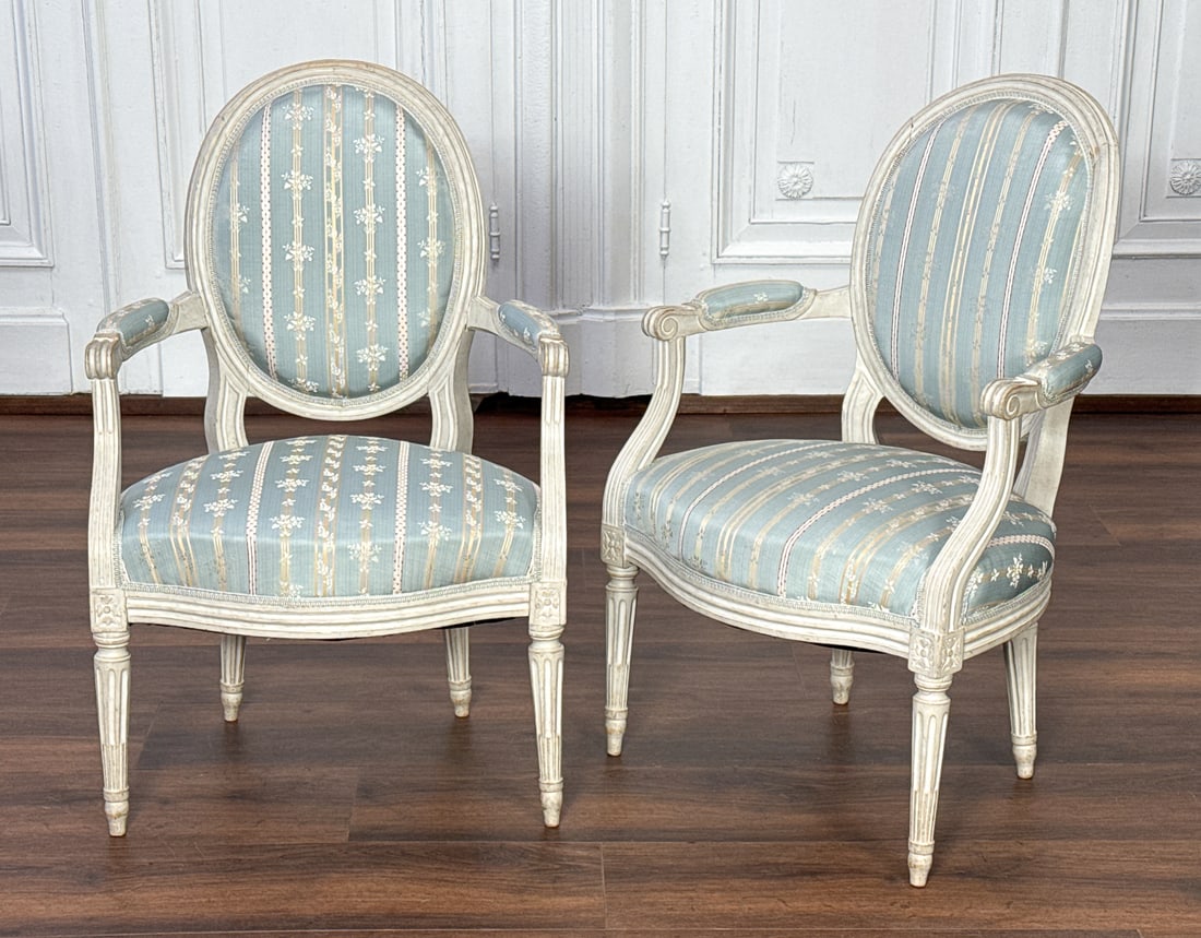 Pair Stamped Period Louis XVI Fauteuil Armchairs: Pair Stamped Period Louis XVI Fauteuil Armchairs, French, 18th Century, By Ebeniste Nicolas Lexcellant, Rails Stamped N. Lexelant, Each With White-Grey Paint Surface, Light Blue Silk Stripe Upholstery