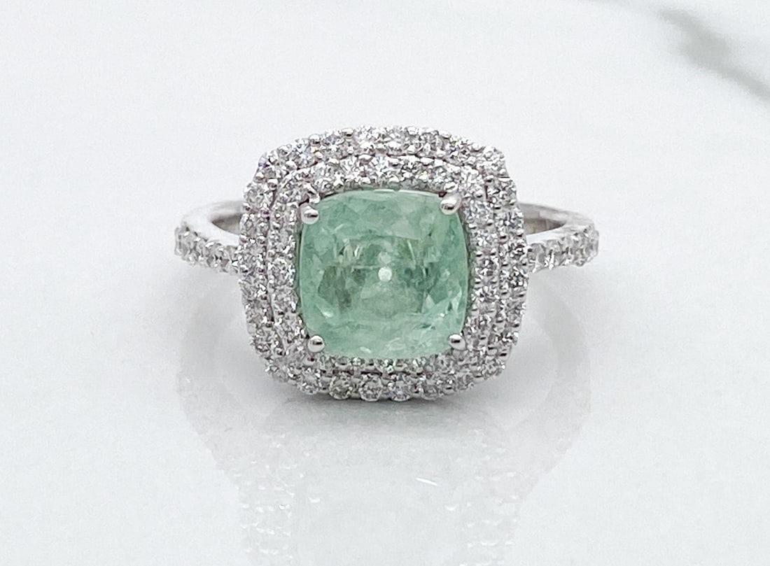 GIA Paraiba Tourmaline & Diamond Platinum Ring: GIA Certified 2.13ctw Paraiba Tourmaline & 0.65ctw F-G, VS2-SI1 Diamonds Set In Platinum, Size 6 3/4, Total Weight 6.2 Grams. Scroll Through All Photos To View GIA Certificate. Note: Wire Transfer Or