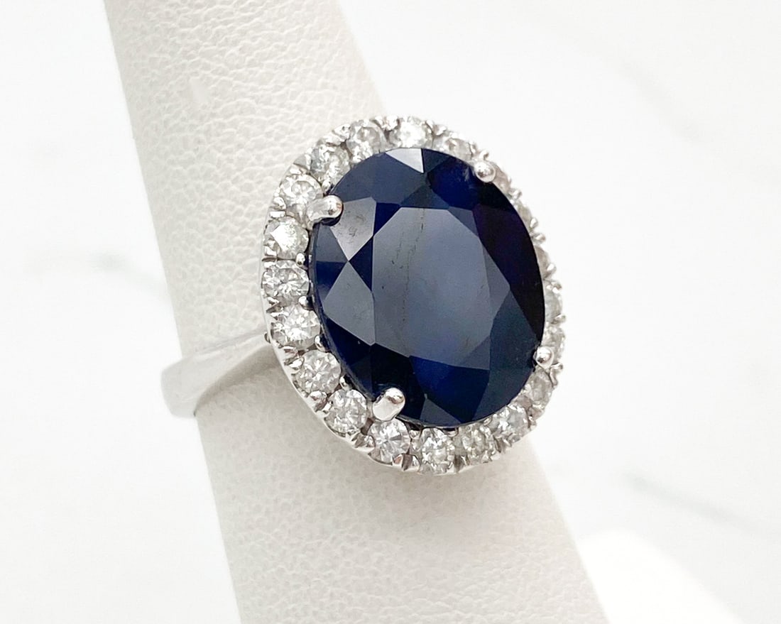 Sapphire And Diamond 14k White Gold Ring: Sapphire And Diamond 14k White Gold Ring, 10.0ctw Sapphire And 0.90ctw SI1-SI2 G-H Diamonds, Size 5.5, 7.5 Grams Total Weight. Note: Wire Transfer Or Cashiers Check Required For Payment Of This Lot.