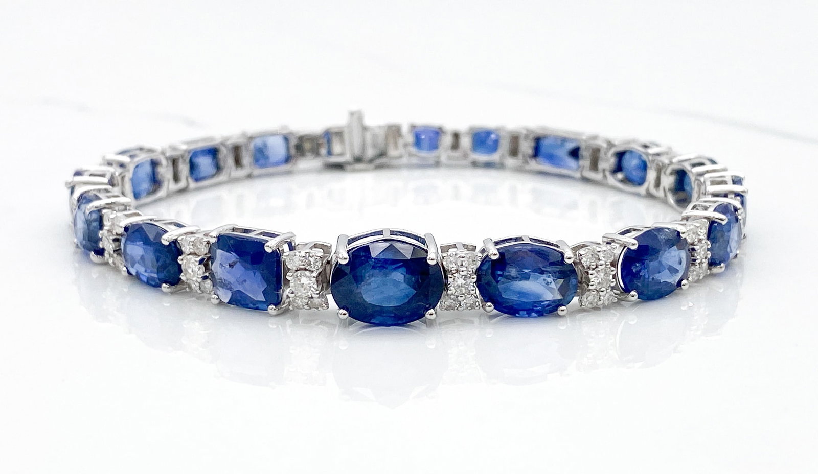 GIA Gem Quality Sri Lanka Sapphire & Natural Diamond Bracelet: GIA Gem Quality Sri Lanka Sapphire & Natural Diamond Bracelet, 28.42ctw Sapphires Accented By 1.58ctw Natural Diamonds Of G-H Color, Vs1-Si1 Clarity, 14k White Gold, Length 7 Inches, Total Weight