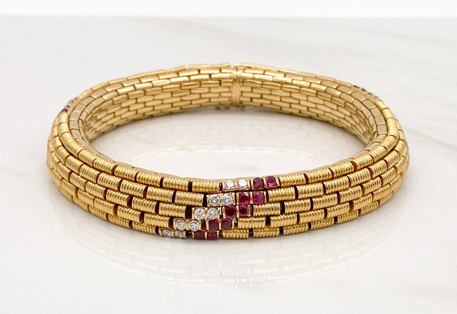 8.5" Carlo Illario Ruby & Diamond Bracelet 18k: Long Carlo Illario Ruby & Diamond Bracelet, Vintage 18k Yellow Gold Flexible Bracelet Having Approximately 1.5ctw Rubies And 1.5ctw F-H, VS Round Brilliant Cut Diamonds. Marked 750 With Illario Hallma