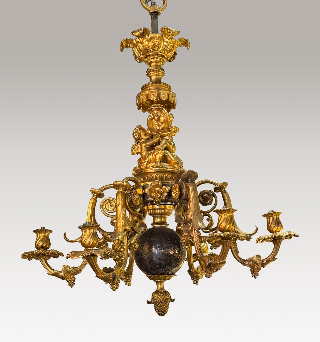 Antique French Parcel Gilt Bronze Chandelier: French, Late 19th Century, Parcel Gilt Bronze Chandelier, Louis XVI Style With Cherubs And Urn On Standard, Six Scroll Arms With Grapevines And Foliate Bobeches, Patinated Spheres, Acorn Pendant,
