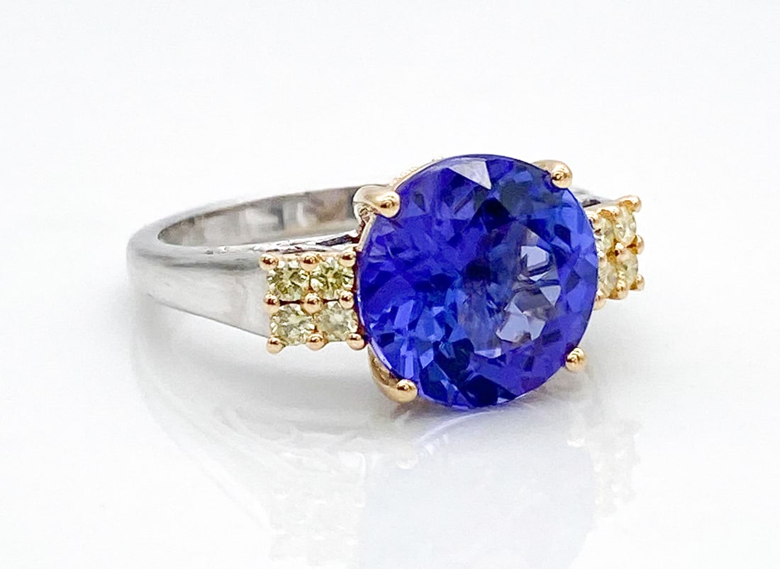 D-Block Tanzanite & Yellow Diamond 14k Ring: D-Block Tanzanite & Yellow Diamond 14k Ring, 4.34ctw Solitaire And 0.18ctw Yellow Side Diamonds, 14k White And Yellow Gold, Size 7, 4.9 Grams Total Weight. Wire Transfer Or Zelle Required For All Jewe