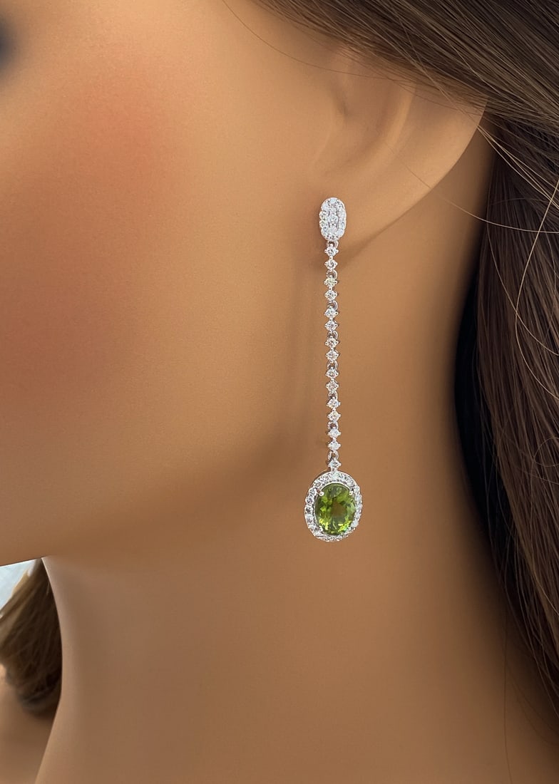 GIA Paraiba Tourmaline & Natural Diamond Earring: GIA Paraiba Tourmaline & Natural Diamond Earring, 5.24ctw Natural Paraiba Tourmalines Suspended From 1.84ctw Natural Diamonds Of F-G Color, Vs1-Vs2 Clarity, Platinum, Posts With Push Backs, Length