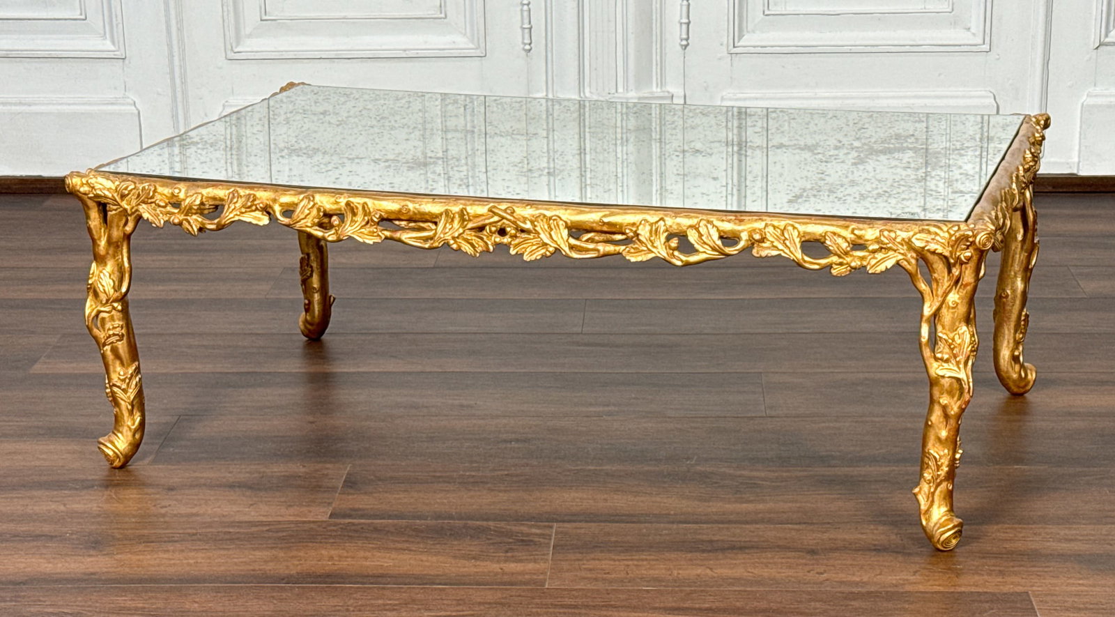 Bagues Manner Giltwood Coffee Table: Bagues Manner Giltwood Coffee Table, Italian, After Bagues, Climbing Vines Inset With Mercury Glass Top, 17.75h X 51w X 31d, See Photos For Some Silver Losses At One Mirror Edge