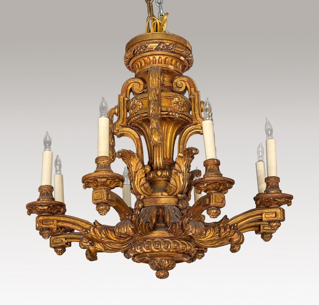 Antique Italian Neoclassical Style Giltwood Chandelier: Italian Neoclassical Style Giltwood Chandelier, Early 20th Century, Fluted And Carved Vasiform Standard, Eight Lights On Outswept Arms, Guilloche And Foliate Pendant, Height 22, Width 22, From The Col
