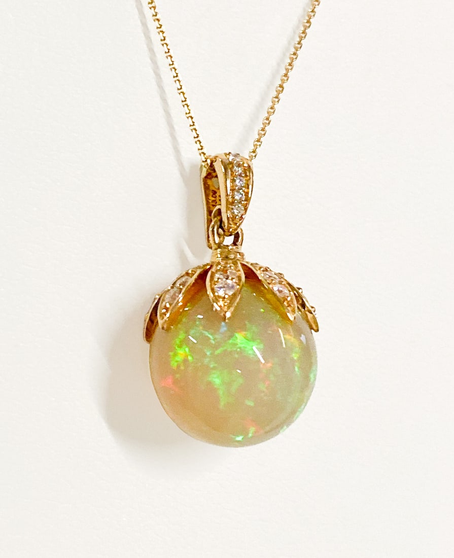 Orion Opal And Diamond Pendant Necklace, 18k: Orion Opal And Natural Diamond Pendant Necklace, 18k Yellow Gold And 13.09ct Orion Opal Sphere With Approximately 0.44ctw Diamonds, On 18k Yellow Gold Chain, Length 18 Inches, 6.9 Grams Total Weight.
