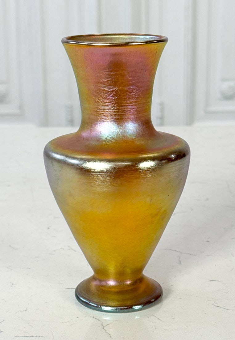 Tiffany Studios Gold Favrile Glass Vase: Tiffany Studios Gold Favrile Glass Vase, American, Early 20th Century, Marked L. C. T. Favrile, 5204 Underside, Baluster Form, Height 6.75, Diameter 4 Inches, Nor Cracks Or Chips Observed, Small Light