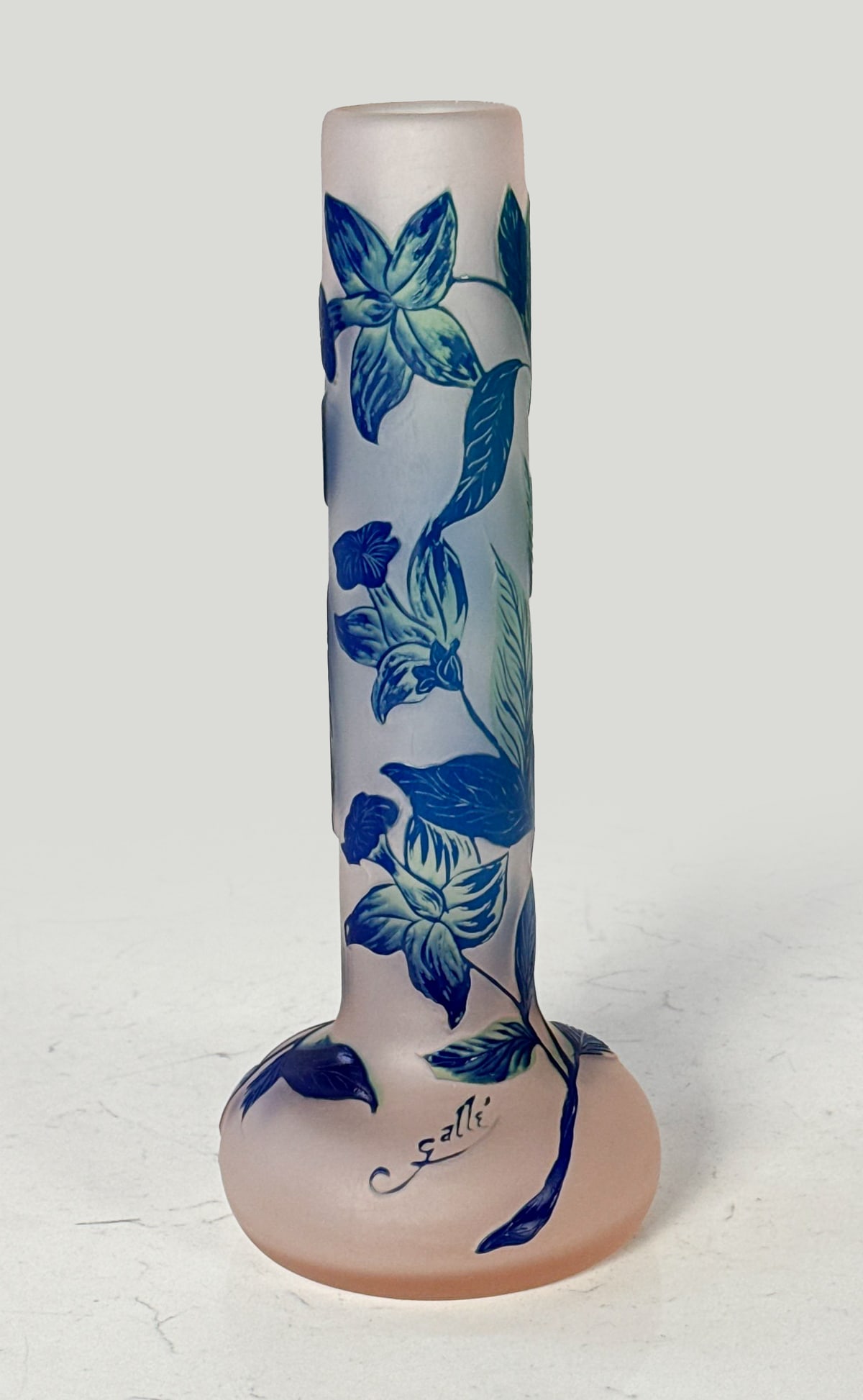 Galle Cameo Art Glass Vase: Galle Cameo Art Glass Vase, French, Early 20th Century, Stick Form Body, Daffodil Flowers And Leaves In Blue And Pink, Signed In Cameo On Lower Body, Height 11, Diameter 4.5 Inches, Review All Photos 
