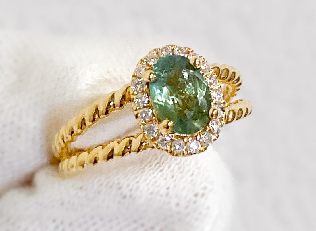 GIA Alexandrite & Natural Diamond 18k ring: GIA Alexandrite & Natural Diamond Ring, 1.07ctw Natural Color Change Alexandrite Surrounded By 0.17ctw F-G, Vs1-Vs2 Natural Diamonds Set In 18k Yellow Gold, Size 6.5, Total Weight 5.6 Grams. Wire Tran