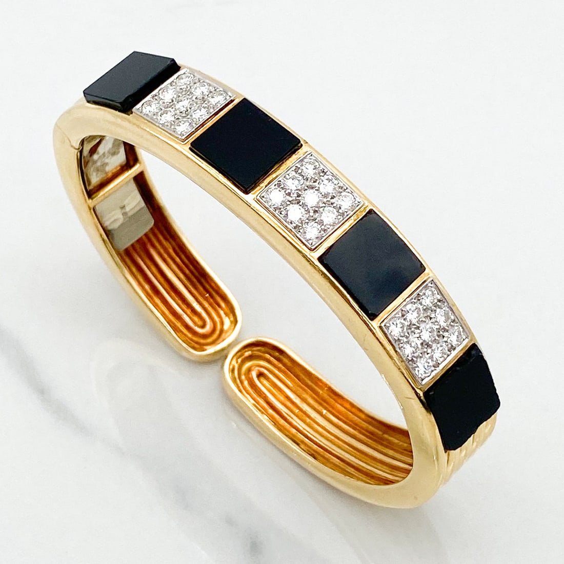 Onyx, Diamond, 18k And Platinum Bracelet: Bracelet Comprised Of Black Onyx, 18k Yellow Gold, Platinum And Approximately 0.22ctw Diamonds, Size 6.25 Inches, Weight 34.5 Grams. Edges Of Onyx Stones Are Chipped, Glue Residue to Backside, Wire
