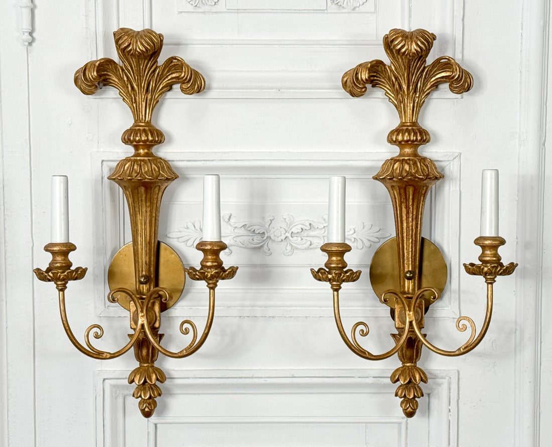 Pair Italian Neoclassical Style Giltwood Sconces: Pair Italian Neoclassical Style Giltwood Sconces, Each Carved With Prince Of Wales Feather Finial And Two Lights On Upswept Arms, Back Stamped Made In Italy, Height 23, Width 12, Depth 6 Inches, Struc