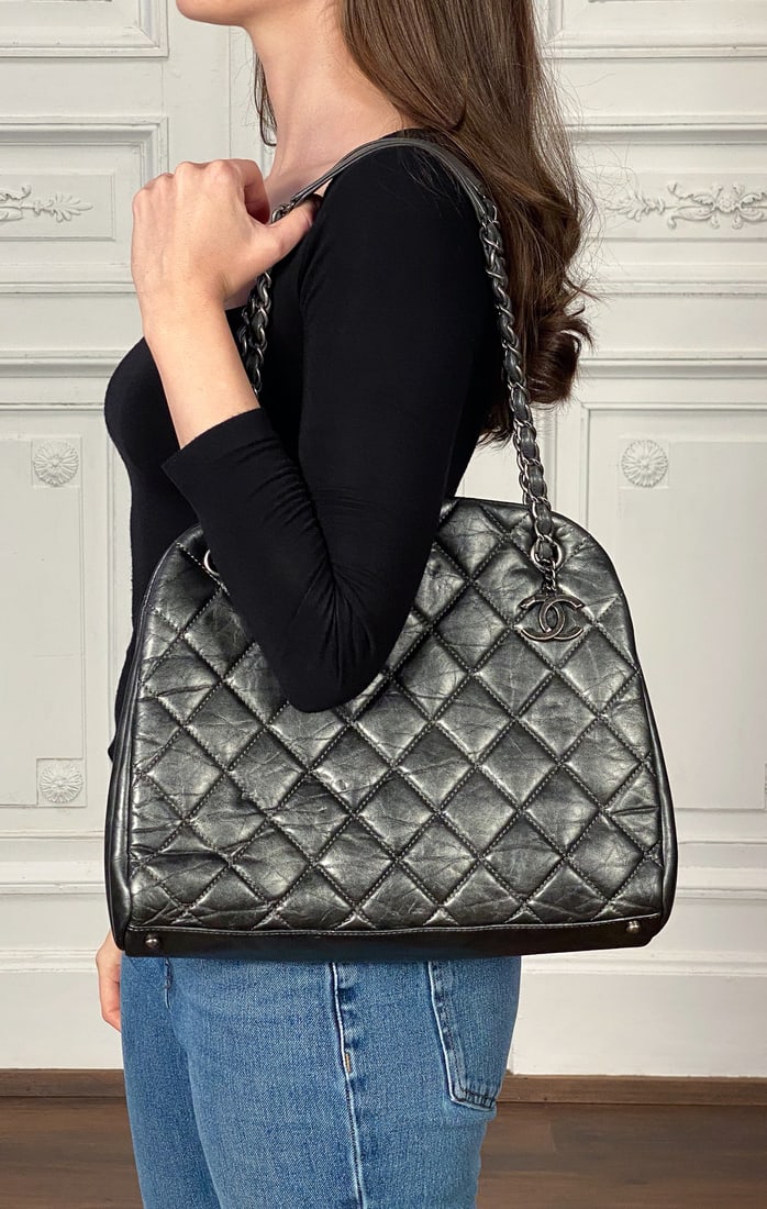 Chanel Just Mademoiselle Bowler Bag: Chanel Just Mademoiselle Bowler Bag, Gray Metallic Leather And Ruthenium Hardware, Center Compartment With Kisslock Closure, Height 10.5, Width 12.5, Depth Approximately 4 Inches. Interior Zipper Fob