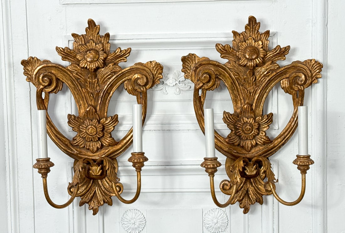 Pair Italian Baroque Style Giltwood Sconces: Pair Italian Baroque Style Giltwood Sconces, Each Carved With Flowers, Drapes And Scrolls, Two Lights On Upswept Arms, Height 20.5, Width 6.5 Depth 14.5 Inches, Structurally Sound And Presenting Well,