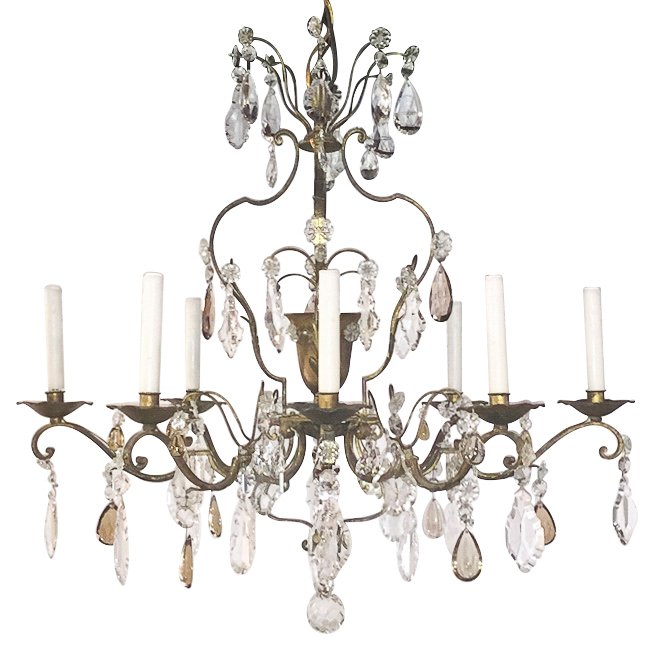Italian Gilt Iron And Crystal Chandelier: with 8-lights. With amethyst and amber accents. 36w x 24d x 35h Electrified. From a Dallas Preston Hollow estate.