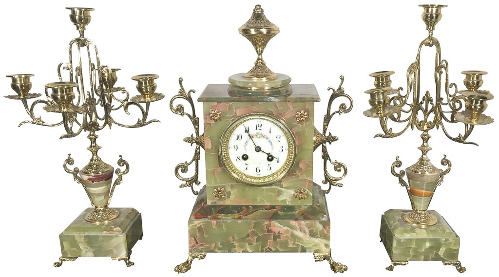 French Green Onyx Garniture, With Polished: brass highlights, set on brass feet, circa 1920, 15 inches high 10 inches wide 6 inches deep, clock ;candelabra 15 inches high