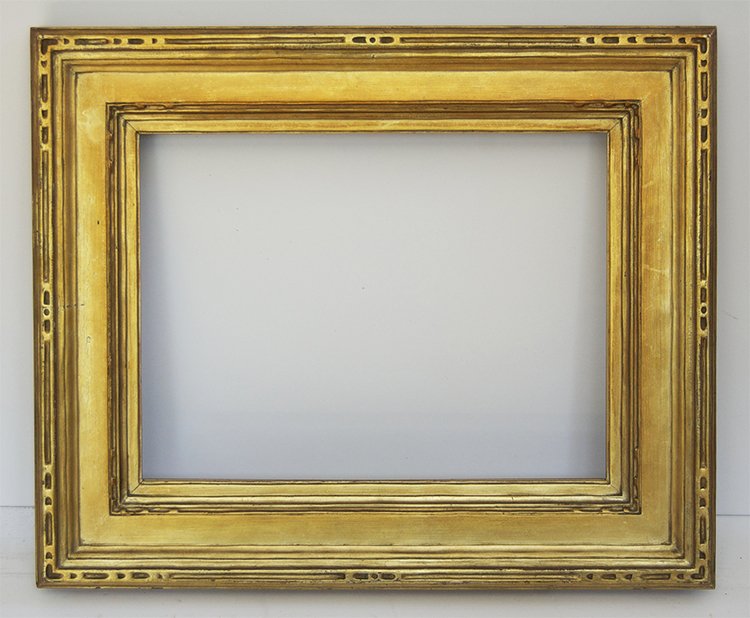 American arts and crafts frame: American 20th C. hand carved and gilded cassetta frame with corner and center carvings. Fits Canvas size:12 x 16 W: 3.5