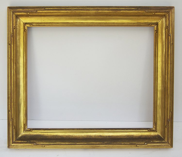 American arts and crafts frame: American 20th C. hand carved and gilded arts and crafts cove frame with Western motifs. Fits Canvas size:16 x 20 W: 3