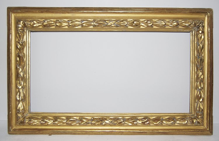 Italian 18th C. hand carved and gilded frame: Italian 18th C. hand carved and gilded frame with running leaf inside top edge. 12.5 x 24.5 W: 3.5