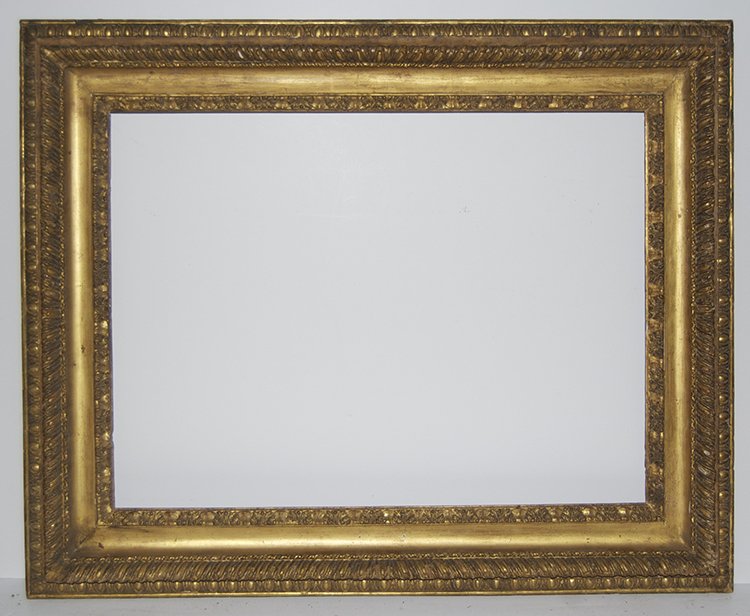 Italian 18th C. hand carved and gilded cove frame: Italian 18th C. hand carved and gilded cove frame with applied carved ornament. 20 x 26.5 W: 4.5