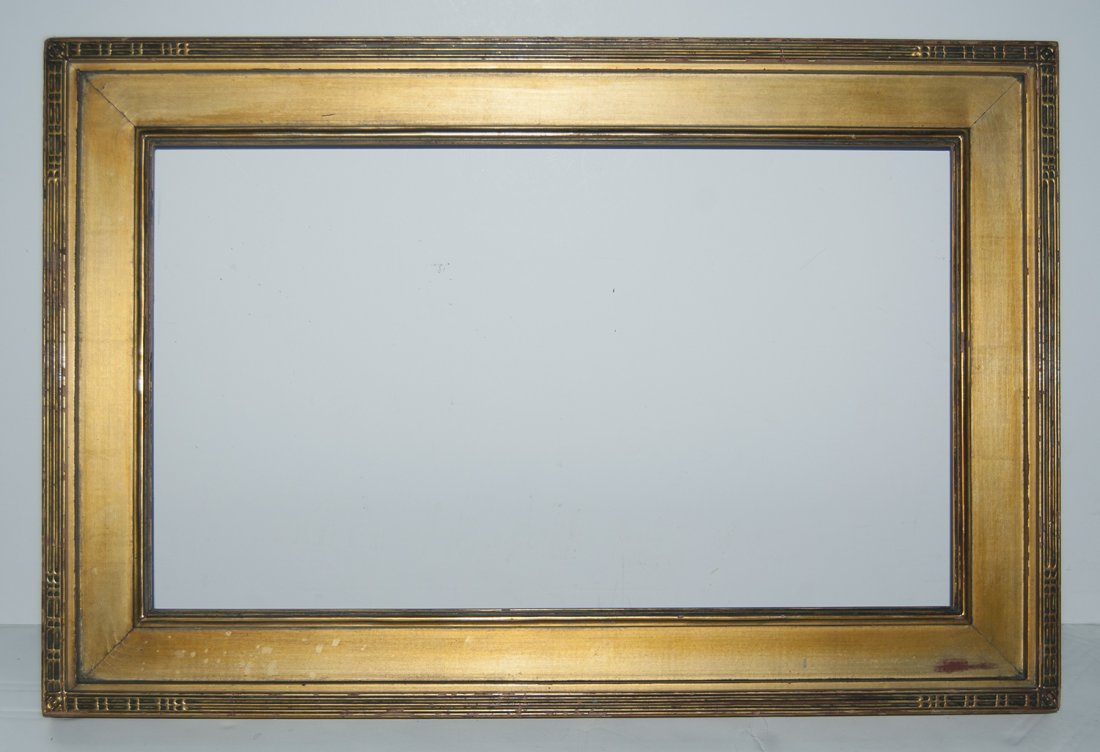 American Arts and crafts frame: American 20th C. hand carved and gilded and gilded cassetta frame 14 x 24 W: 3