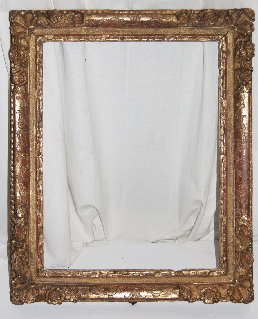 French Louis XIII hand carved and gilded frame: French Louis XIII hand carved and gilded frame with leaf and berry and feather motif 18 x 24 W: 3.5