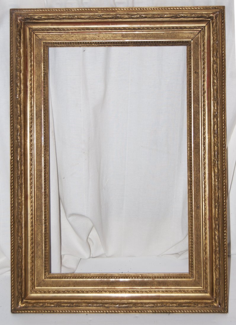 French 19th C. applied ornament and gilded cove frame: French 19th C. applied ornament and gilded cove frame with sand frieze and leaf and berry top rail 14 x 22 W: 3.5