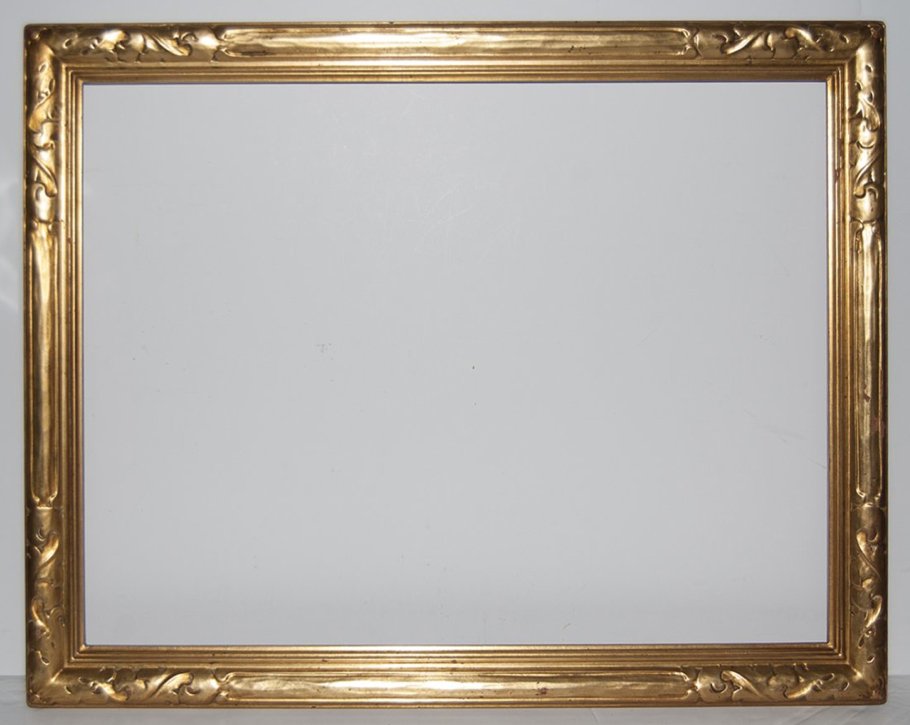 American 20th C. hand carved and gilded arts and crafts: American 20th C. hand carved and gilded arts and crafts frame Canvas size frame can accommodate: 19 x 26 Frame width: 2