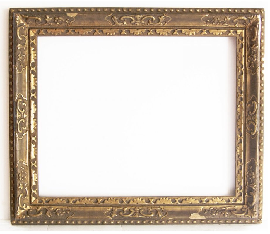 American 20th C. frame by Newcomb Macklin: American 20th C. applied ornament and gilded Newcomb Macklin cove frame Canvas that frame will accommodate: 22 x 27 Frame width: 4