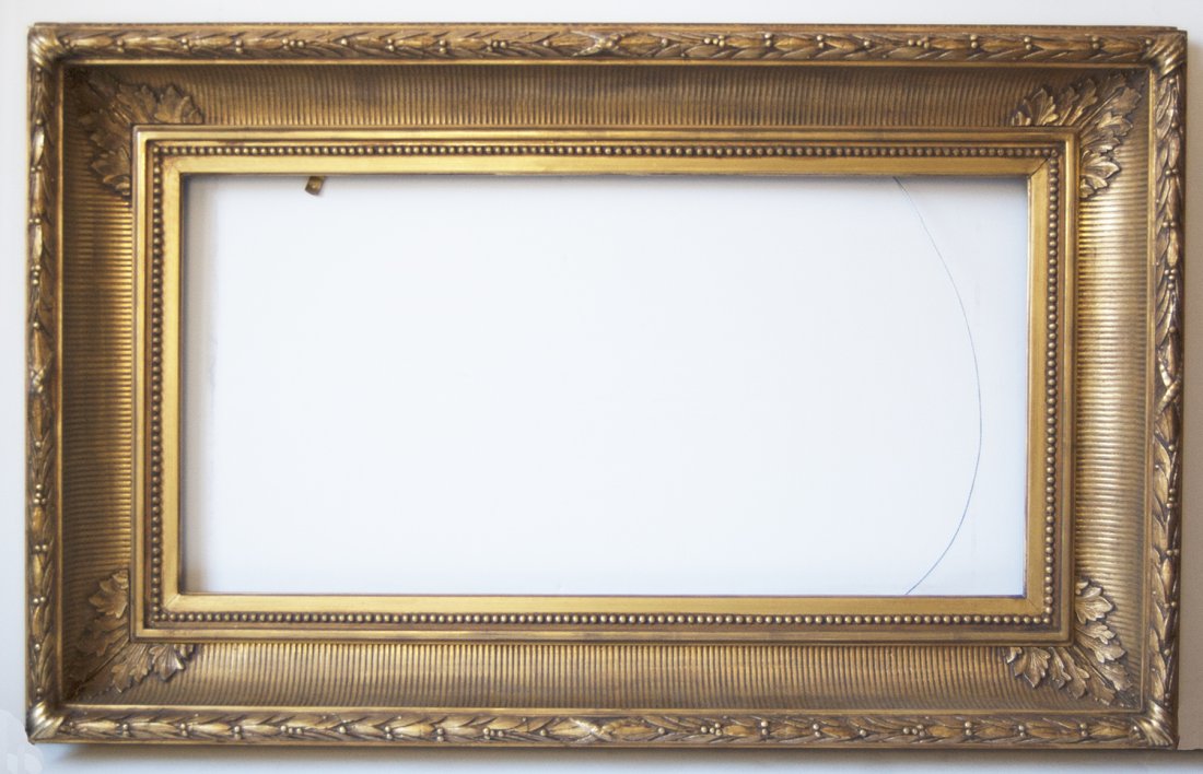 American 19th C. Hudson River School fluted cove: American 19th C. applied ornament and gilded fluted cove frame with leaf and berry Canvas that frame will accommodate: 15 x 30 Frame width: 5